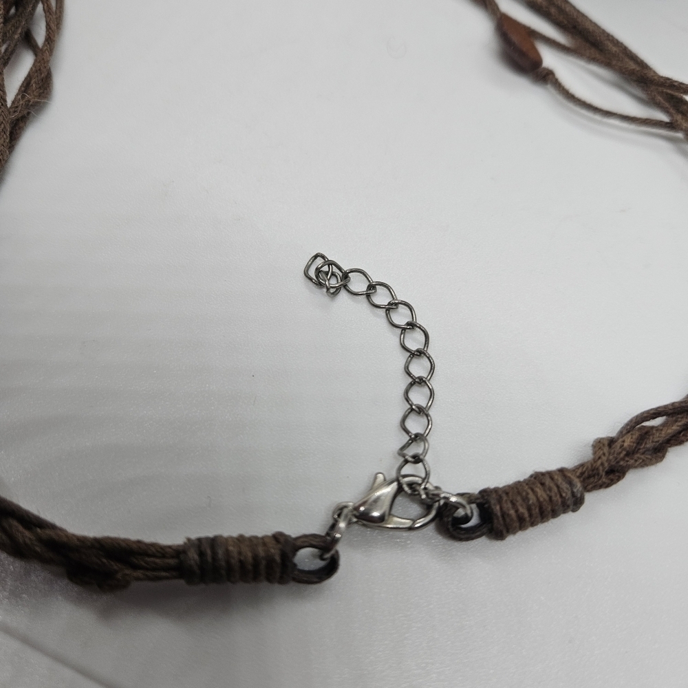 brown cord necklace with wooden beads and large coconut shell inlay pendant - Picture 3 of 3